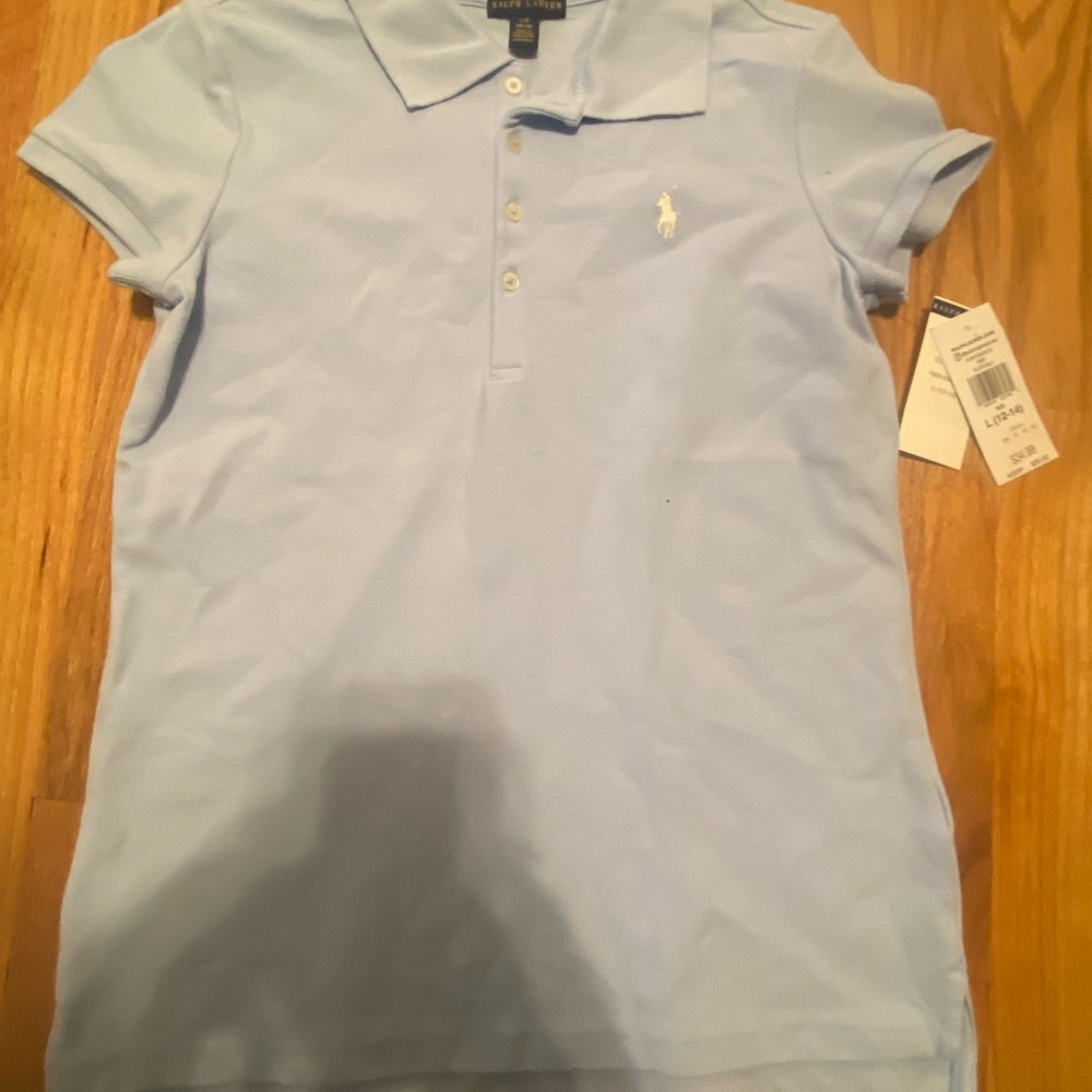 Girl’s Polo Ralph Lauren shirt new with tags in light blue